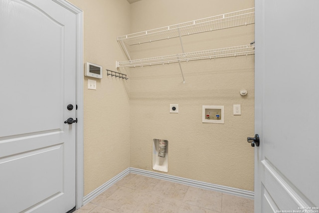 11806 Jasmine Way, San Antonio, TX 78253 - laundry area featuring washer hookup, laundry area, hookup for a gas dryer, baseboards, and hookup for an electric dryer