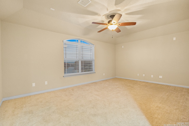 unfurnished room with carpet floors and ceiling fan