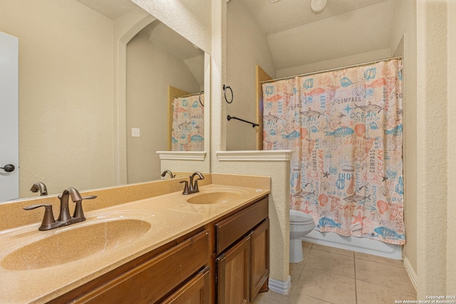 11806 Jasmine Way, San Antonio, TX 78253 - full bathroom featuring double vanity, toilet, tile patterned floors, and a sink