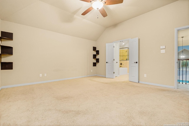 11806 Jasmine Way, San Antonio, TX 78253 - empty room with light colored carpet, a ceiling fan, baseboards, and vaulted ceiling