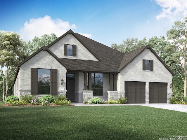 view of front of house featuring a garage and a front lawn