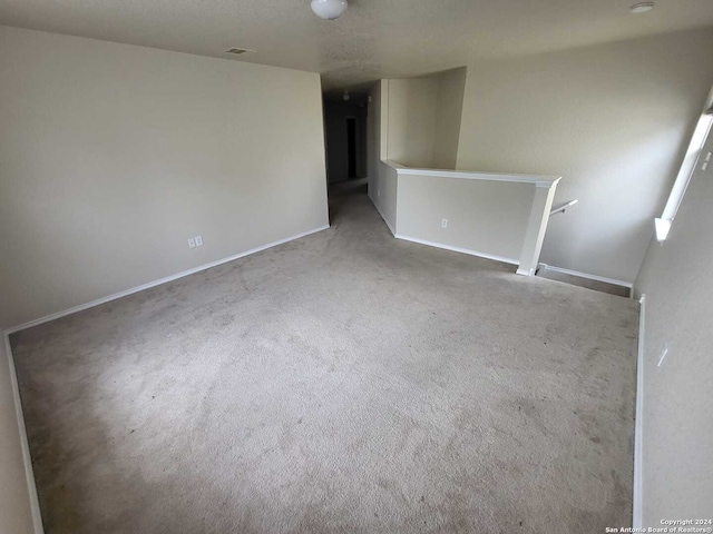 spare room with carpet floors