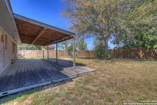 view of yard with a wooden deck