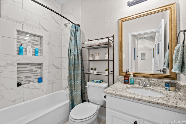 full bathroom featuring shower / tub combo with curtain, vanity, and toilet