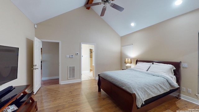 bedroom featuring high vaulted ceiling, beam ceiling, light hardwood / wood-style floors, and ceiling fan