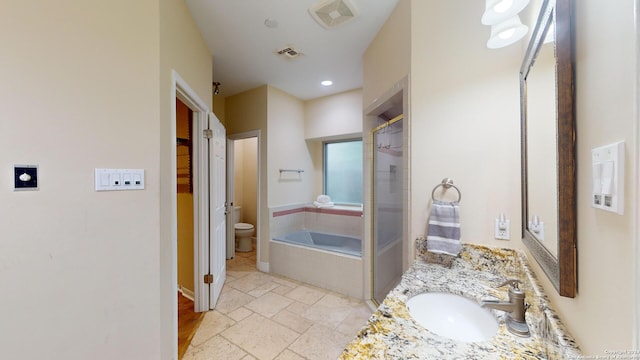 full bathroom with independent shower and bath, vanity, and toilet