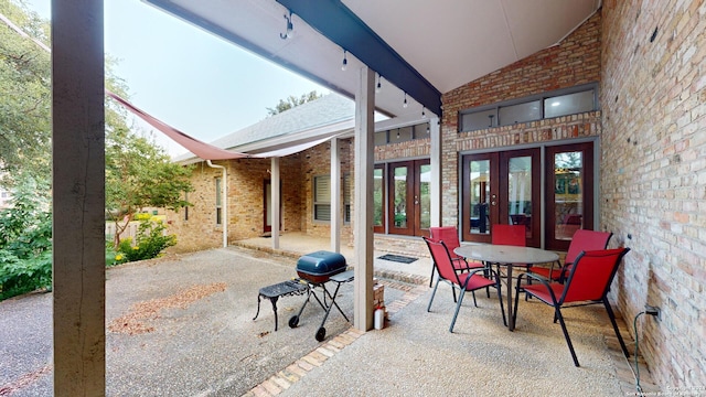 view of patio featuring grilling area and french doors