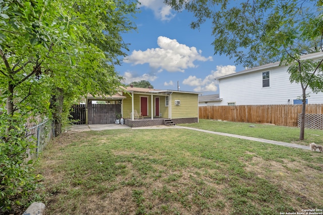 exterior space featuring a patio and a front lawn