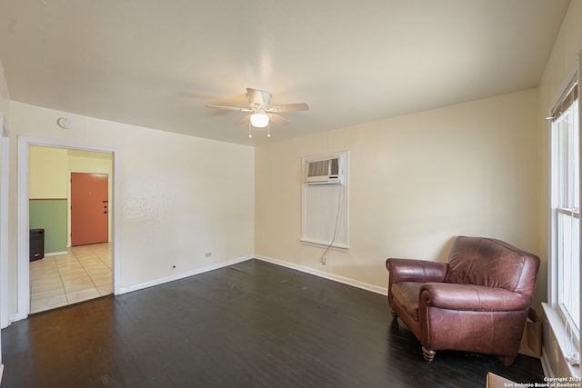 unfurnished room featuring wood-type flooring, plenty of natural light, ceiling fan, and a wall mounted AC