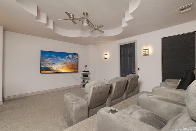 carpeted cinema with ceiling fan