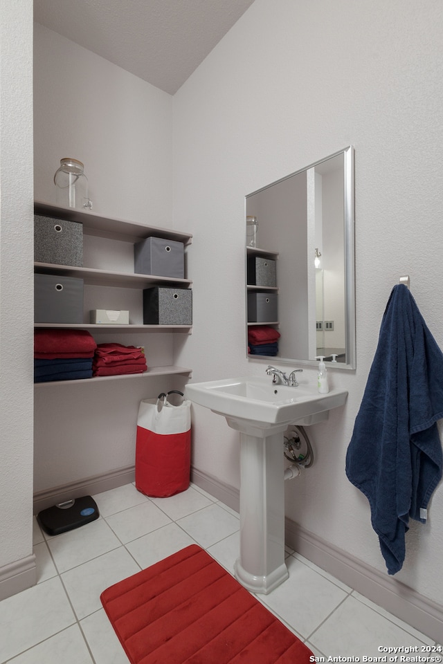 bathroom with tile patterned flooring