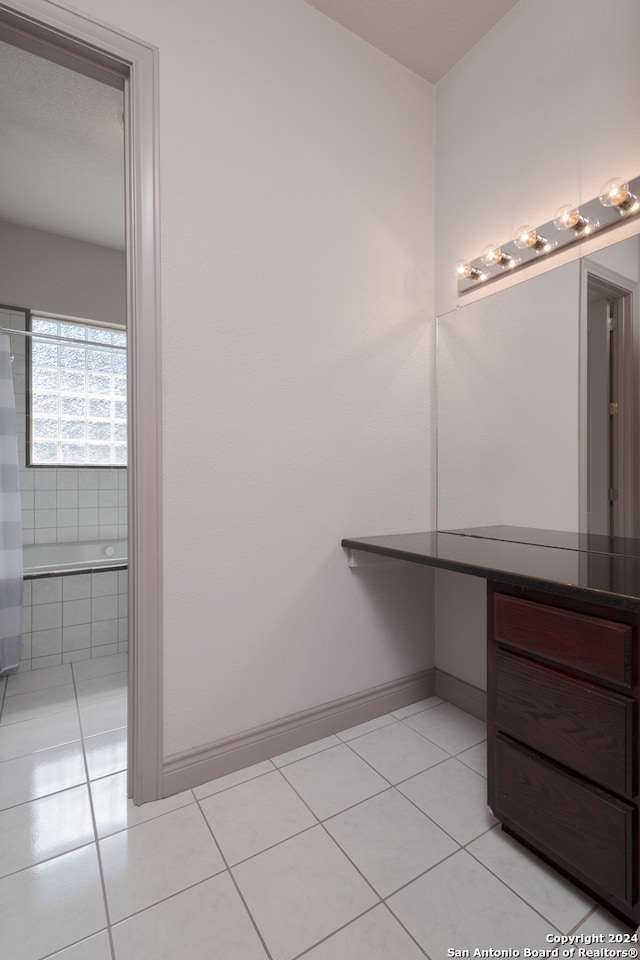 bathroom with vanity and tile patterned floors