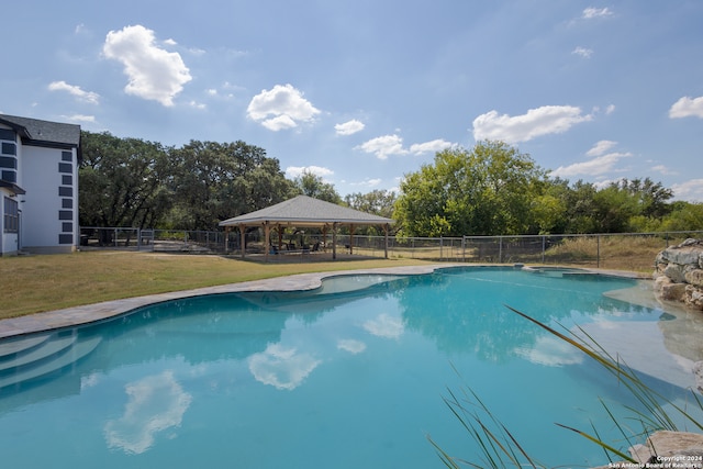 view of pool featuring a gazebo and a yard