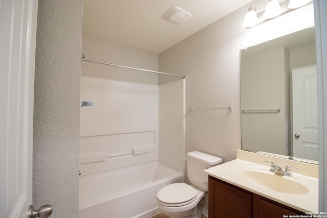 full bathroom featuring vanity, shower / bath combination, and toilet