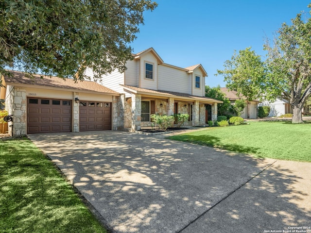 view of front of property featuring a front lawn and a porch