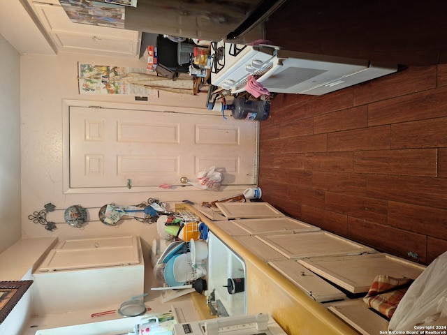 kitchen with wooden walls