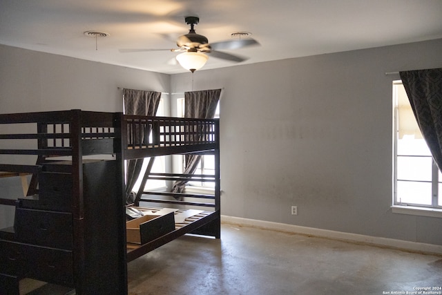 bedroom with concrete flooring