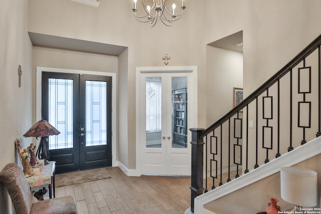 foyer entrance with a healthy amount of sunlight and french doors