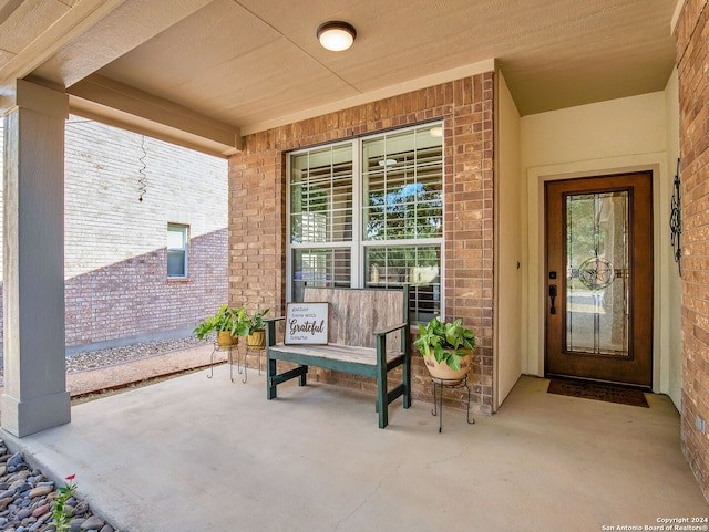 entrance to property with covered porch