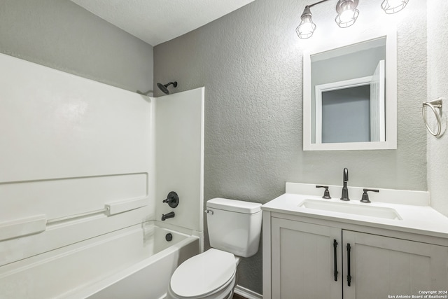 full bathroom featuring shower / bathing tub combination, vanity, toilet, and a textured ceiling