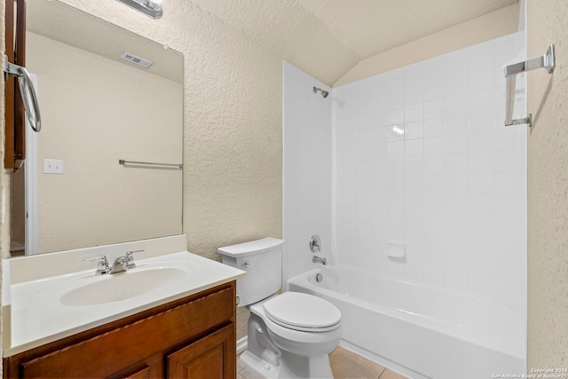 full bathroom with tile patterned flooring, toilet, washtub / shower combination, vanity, and a textured ceiling