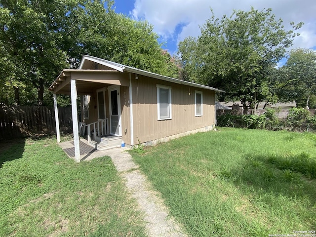 2019 Martin Luther King Dr, San Antonio, TX 78203 - view of front of property with a front yard and fence