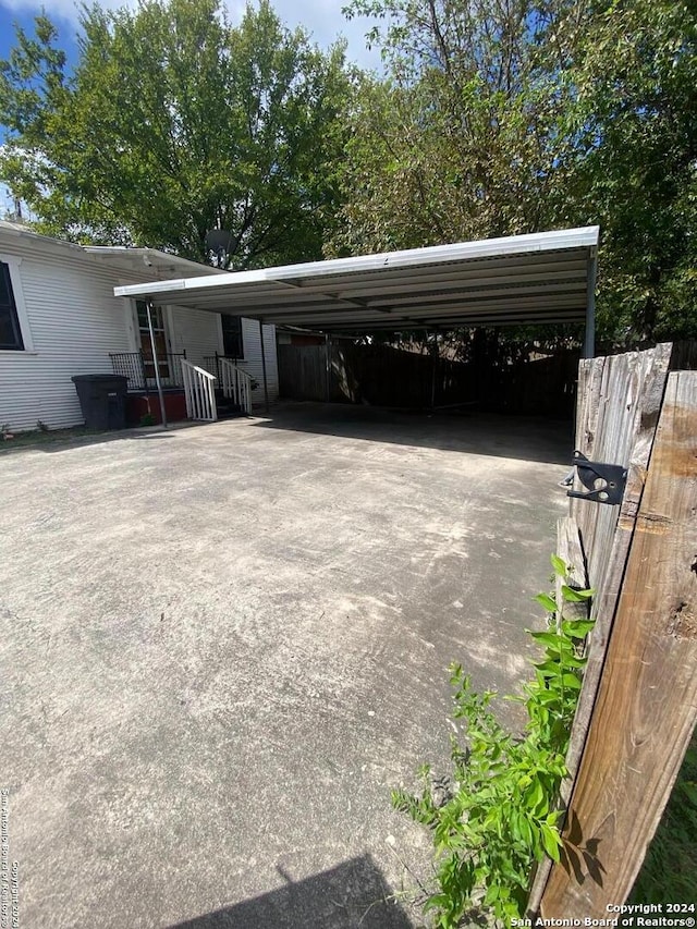 2019 Martin Luther King Dr, San Antonio, TX 78203 - view of parking / parking lot with a carport and driveway