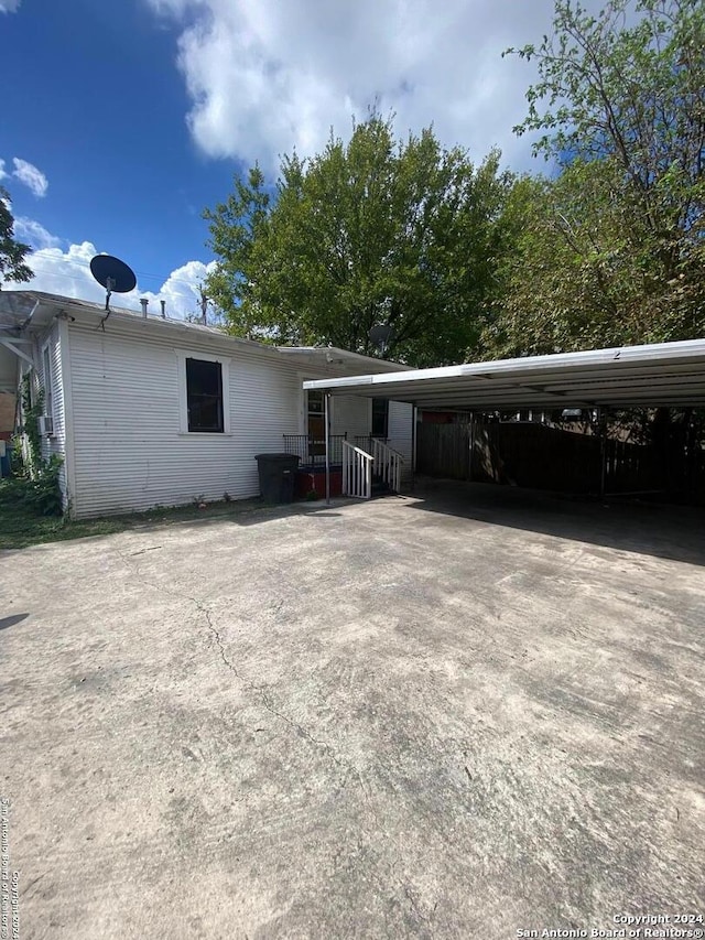 2019 Martin Luther King Dr, San Antonio, TX 78203 - exterior space featuring a carport and driveway