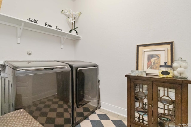 3443 Iron Cyn, Bulverde, TX 78163 - clothes washing area featuring washing machine and dryer, baseboards, and laundry area