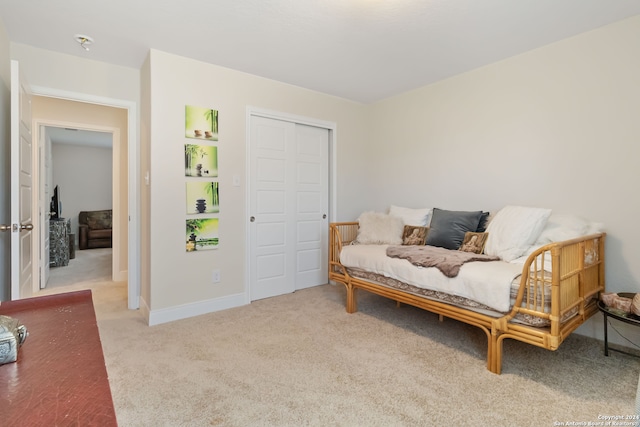 living area featuring light colored carpet