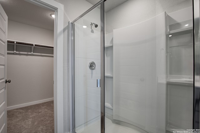 bathroom featuring walk in shower