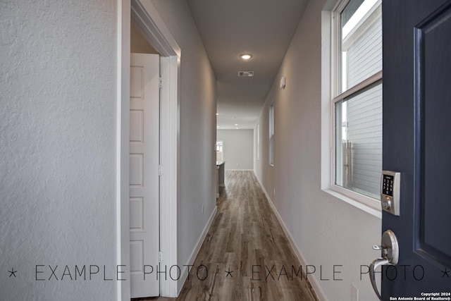 hall featuring hardwood / wood-style floors