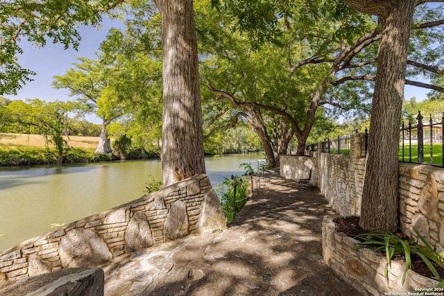 view of patio featuring a water view