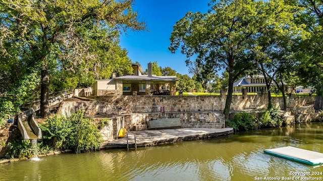 dock area with a water view