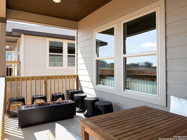 view of patio with an outdoor fire pit