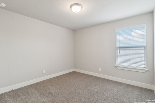 empty room with carpet floors