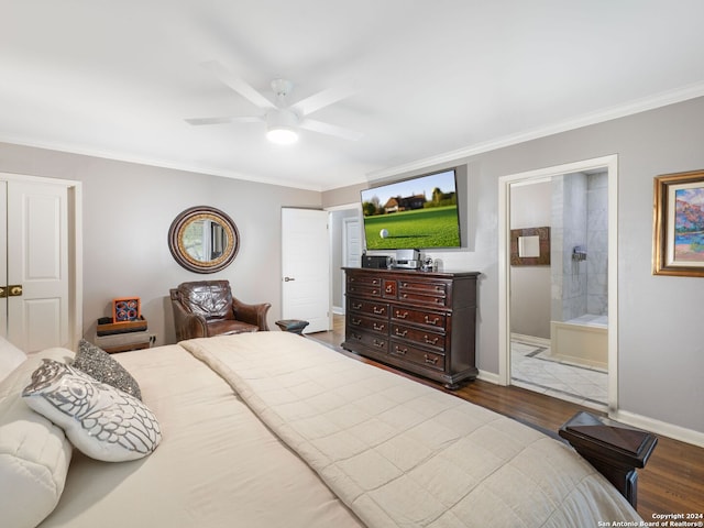 bedroom featuring ceiling fan, crown molding, connected bathroom, and hardwood / wood-style flooring