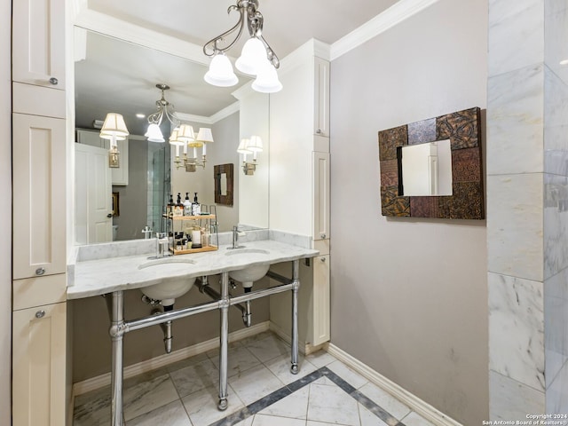 bathroom featuring ornamental molding and vanity