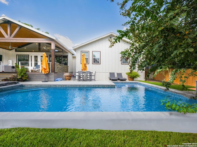 view of pool featuring a patio and ceiling fan