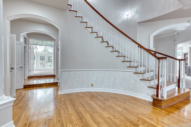 stairway featuring hardwood / wood-style flooring