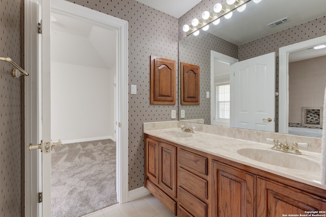 bathroom featuring vanity and tile patterned flooring