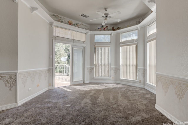 carpeted empty room with ceiling fan