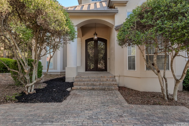 doorway to property featuring french doors