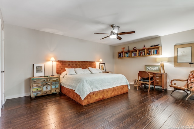 bedroom featuring ceiling fan and dark wood-type flooring