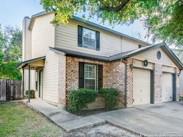 view of front of property with a garage