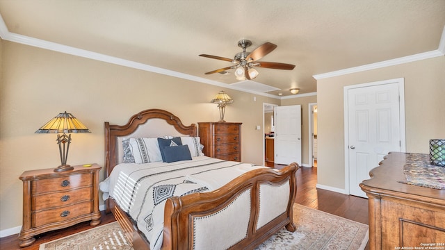 bedroom with ceiling fan, crown molding, and dark hardwood / wood-style flooring