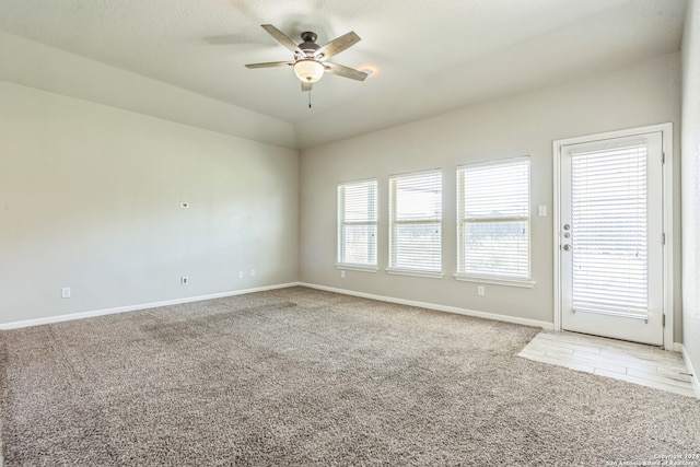 unfurnished room featuring ceiling fan and light colored carpet