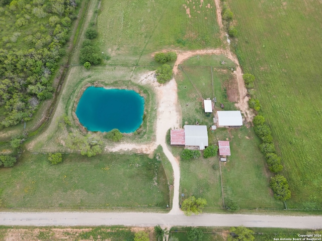 birds eye view of property featuring a rural view