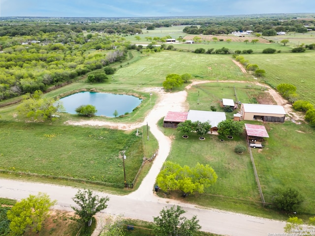 aerial view with a water view and a rural view