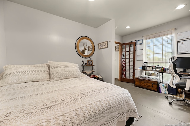 bedroom with concrete flooring